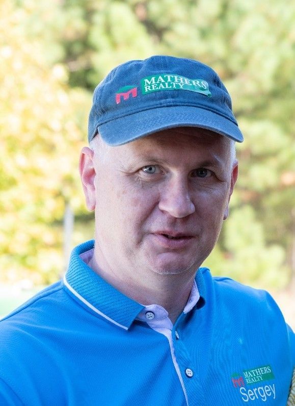 Interior wooden staircase in modern Charlotte North Carolina home.
