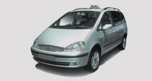 A large silver people carrier