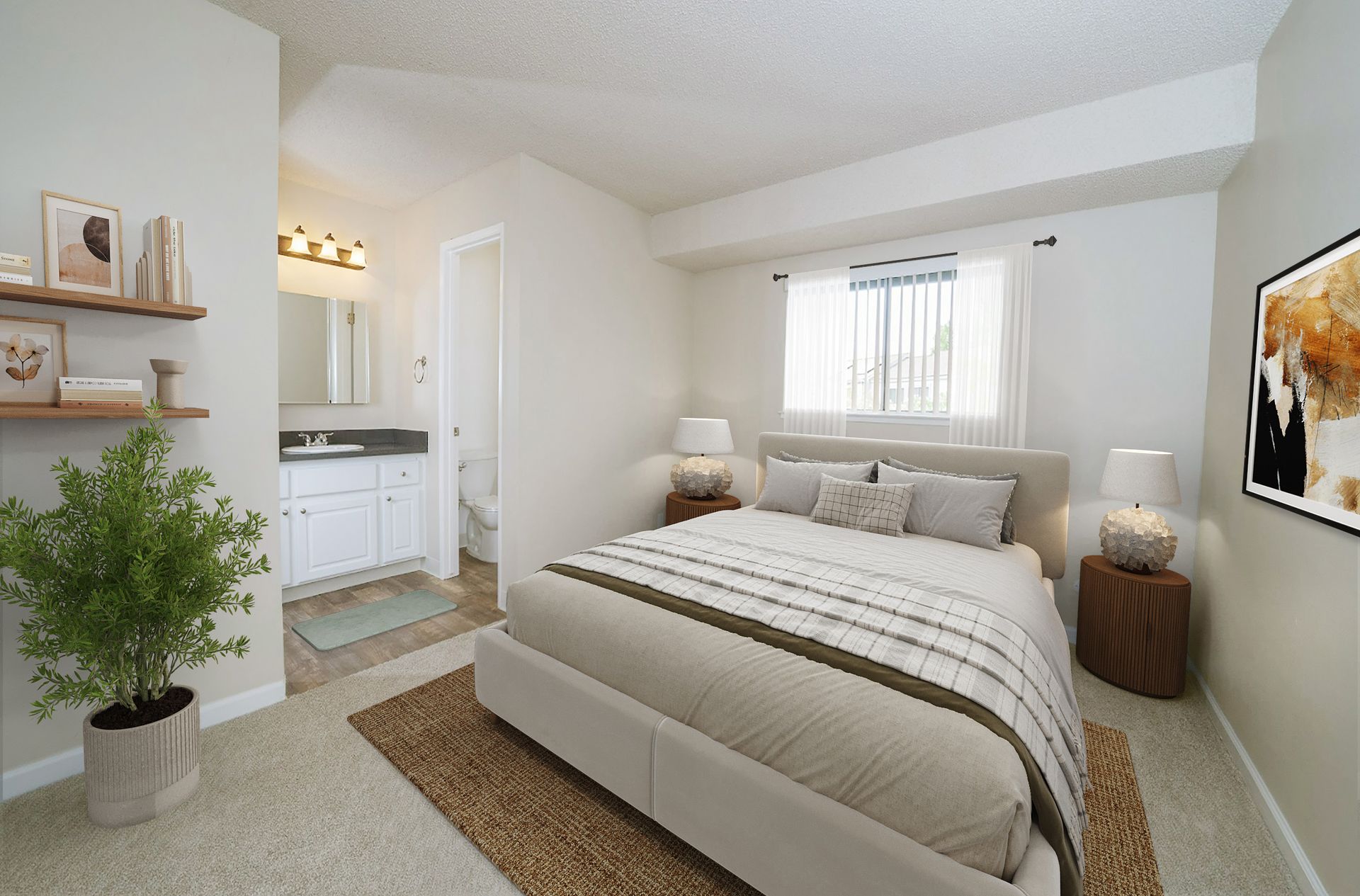 Bedroom with bed, bathroom, plant, rug, and artwork. Neutral color scheme.