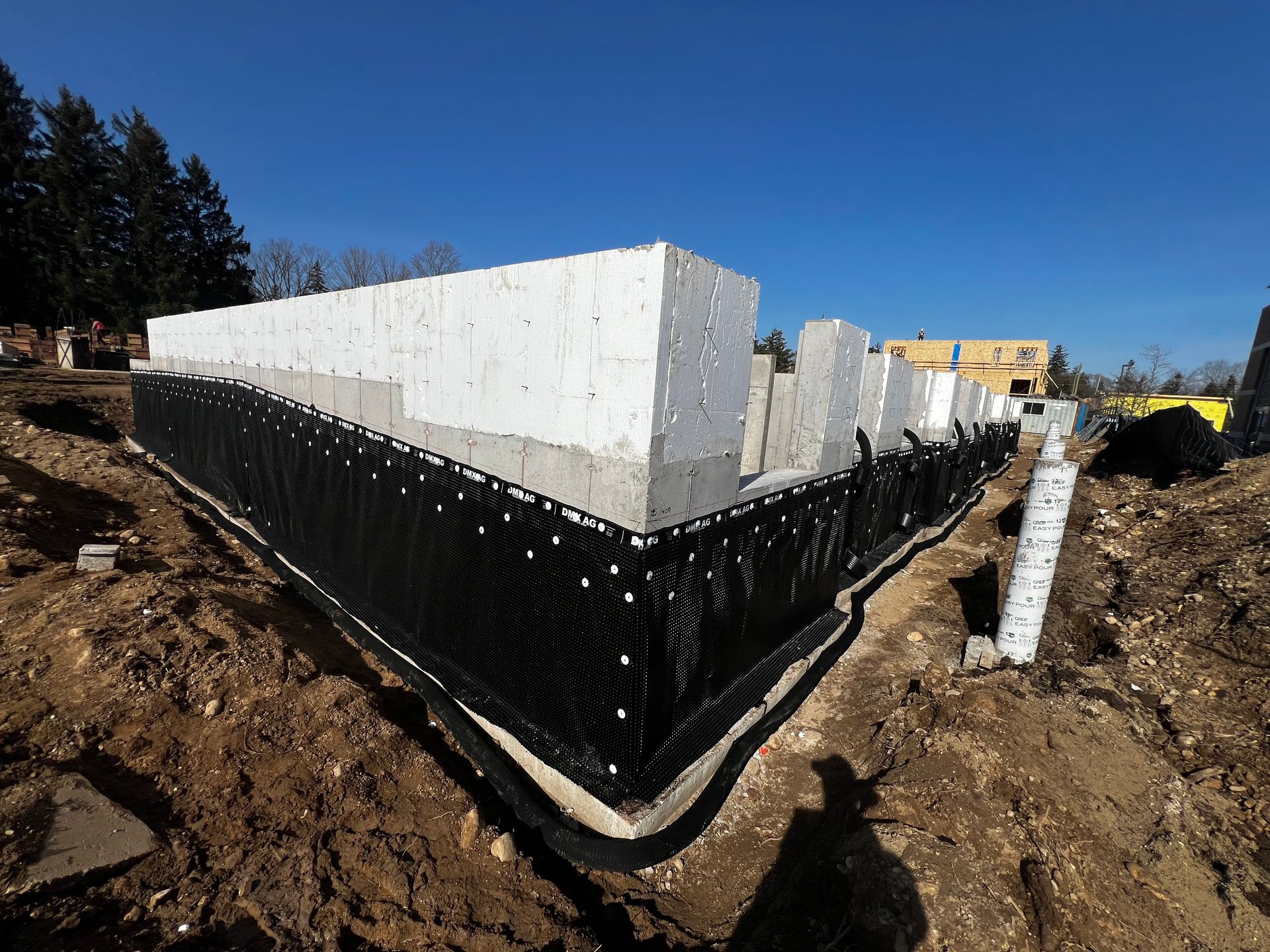 The foundation of a house is being built with Insulated Concrete Forms (ICF) foundation.