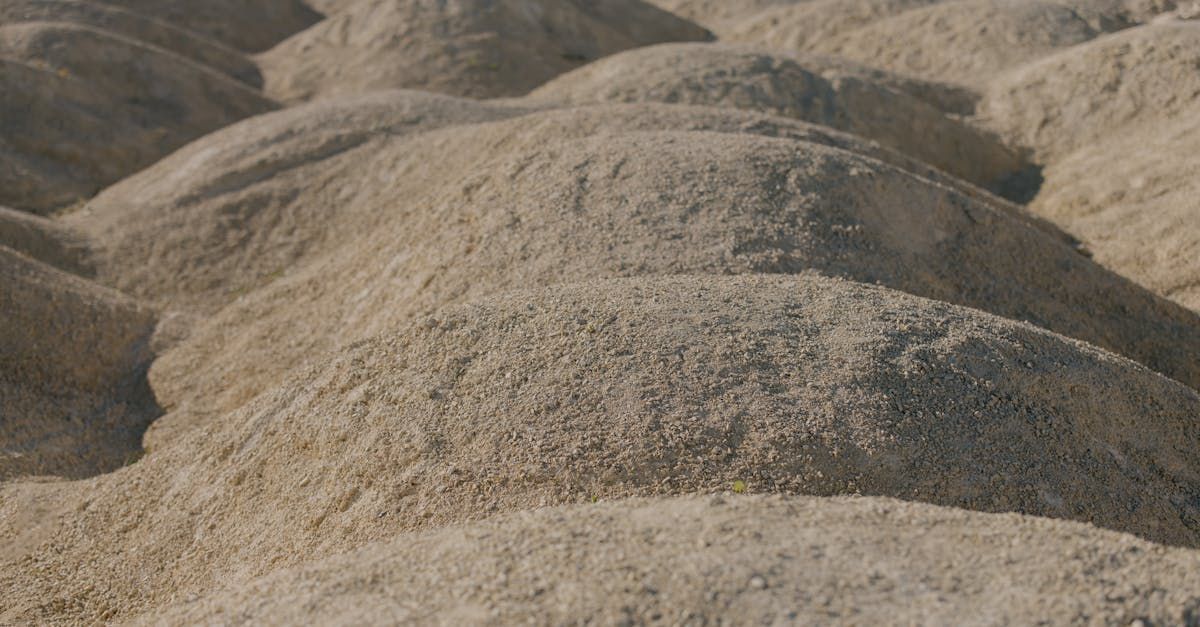 A pile of sand is sitting on top of a hill.