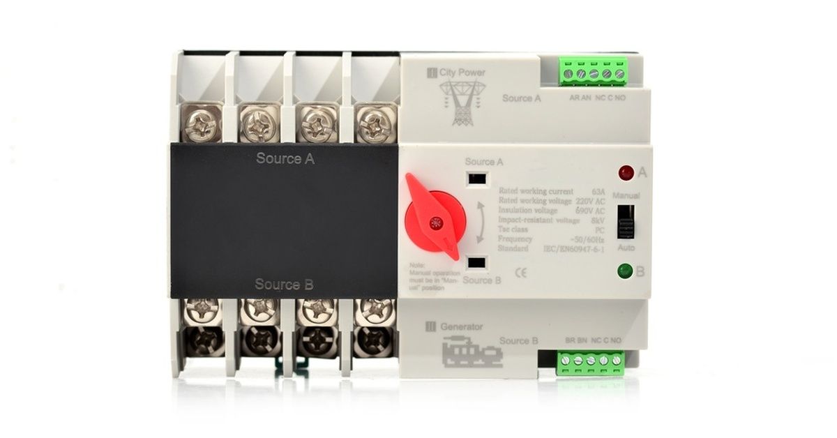 A small electrical panel has a red knob with options for a generator and city power alongside it.