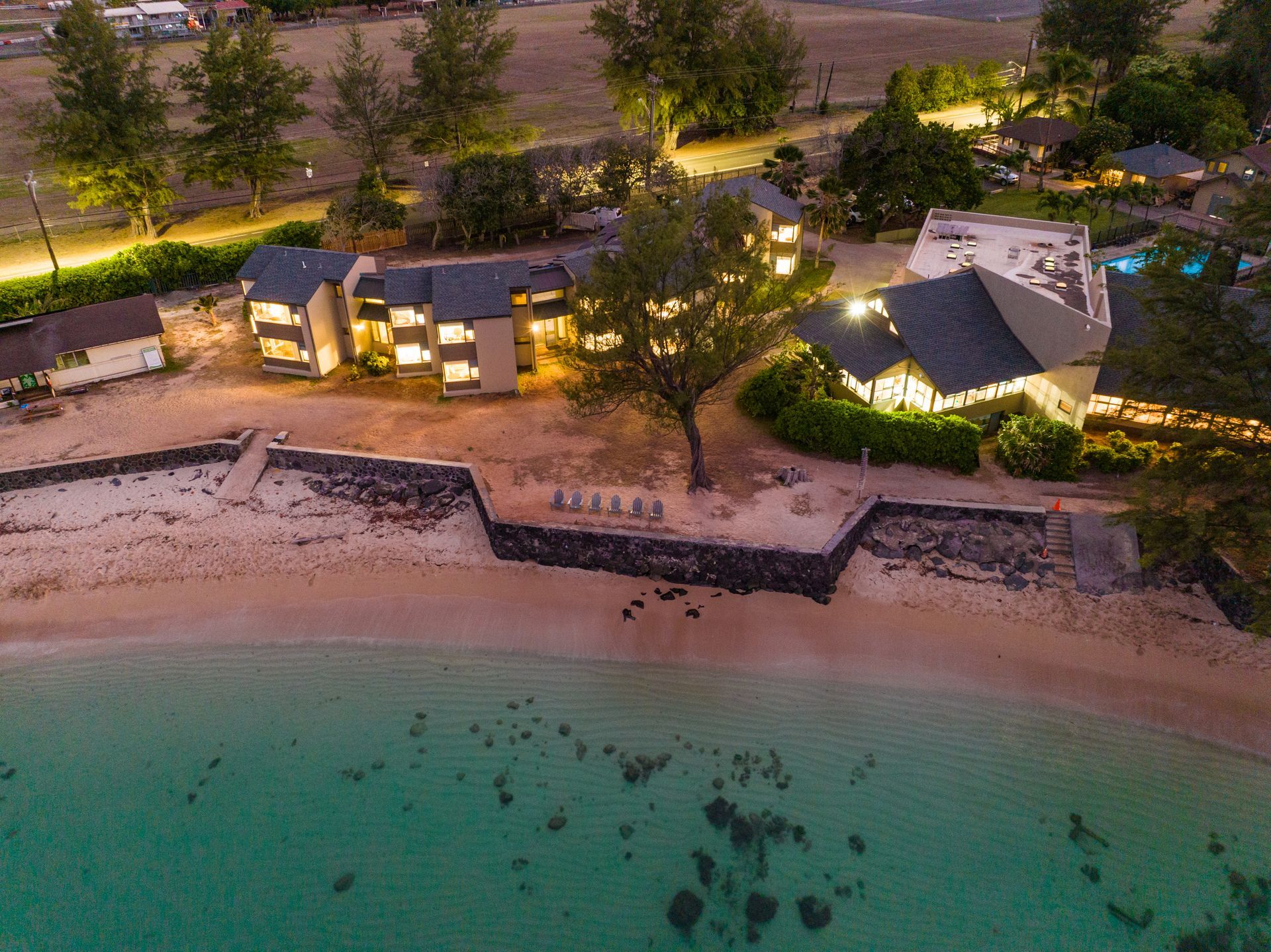 A building with a palm tree in front of it