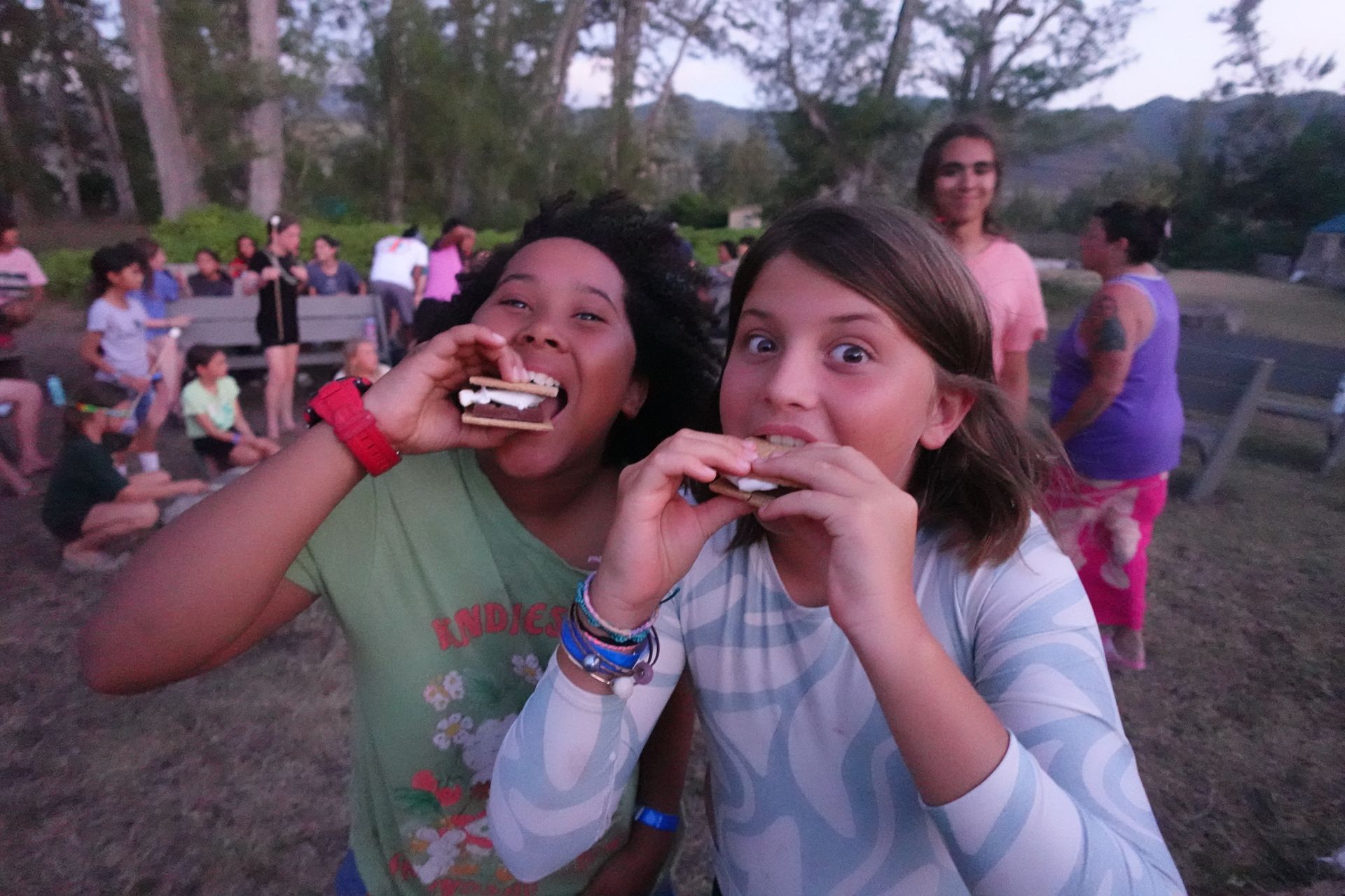 A group of people are riding rafts in the ocean.