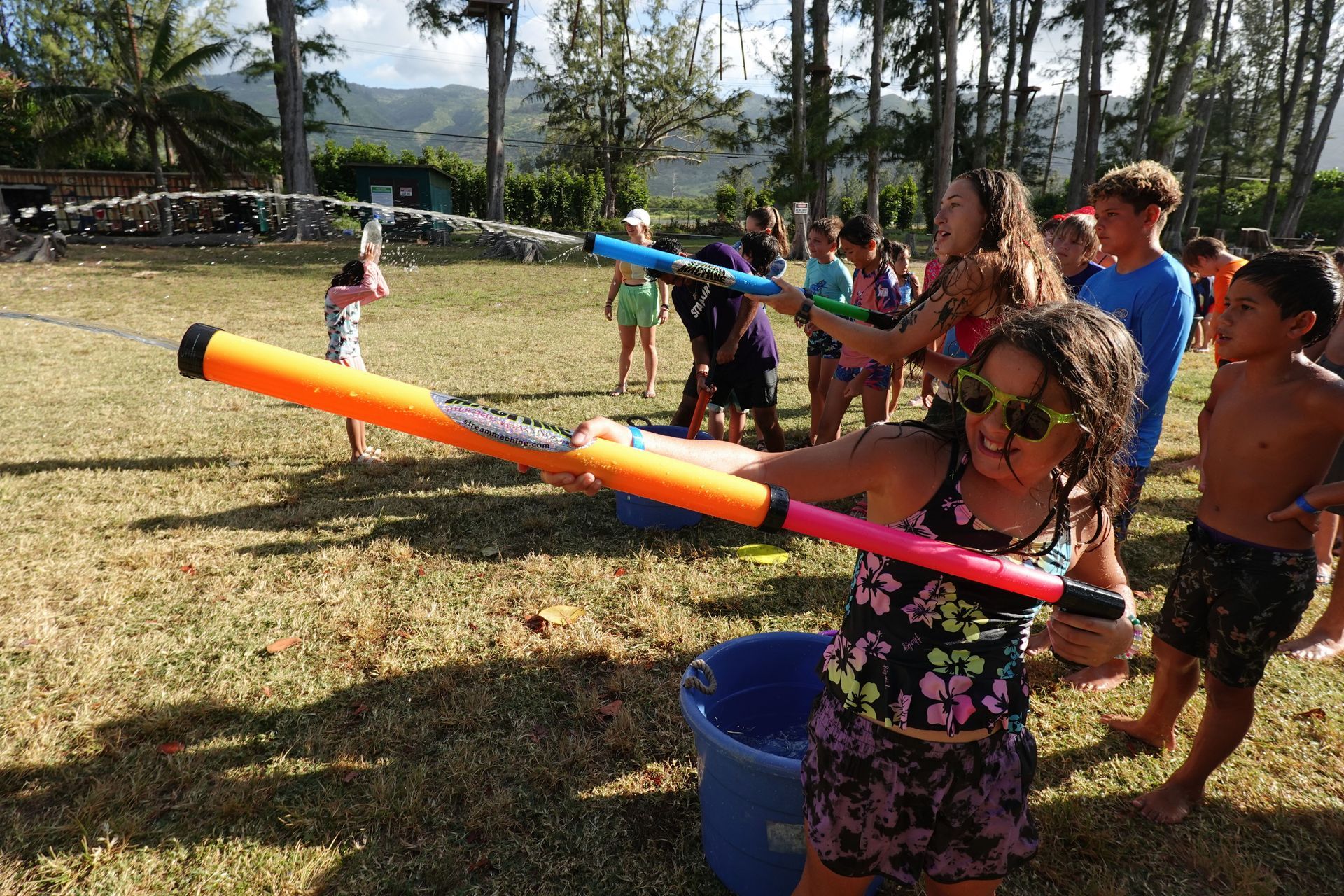 image of kid playing with water gun