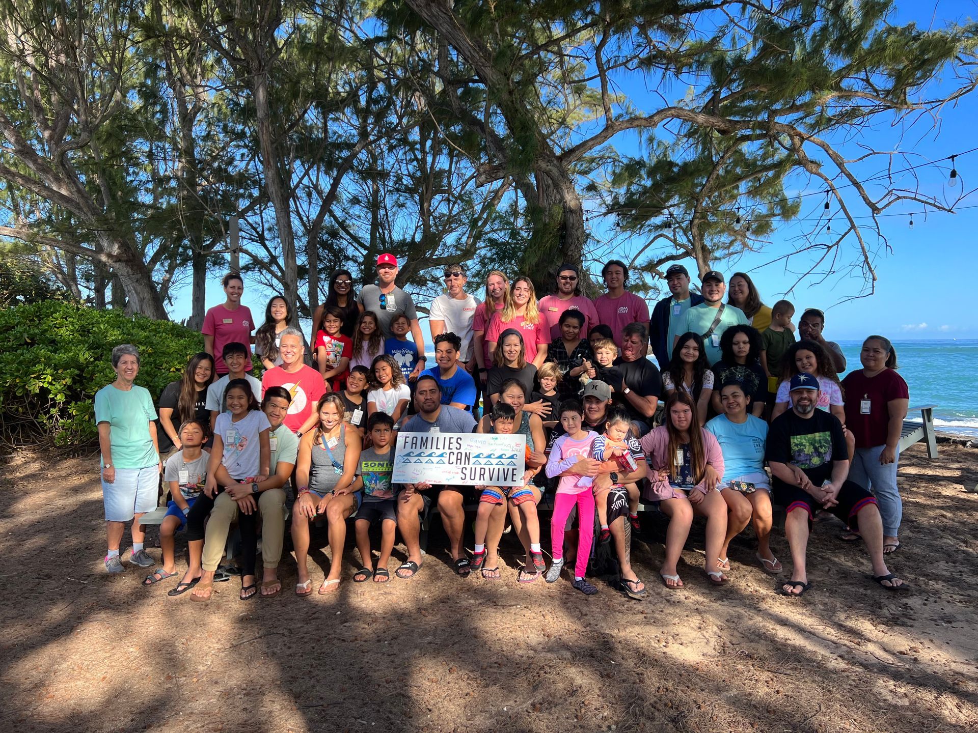 A group of people with paint on their faces are posing for a picture