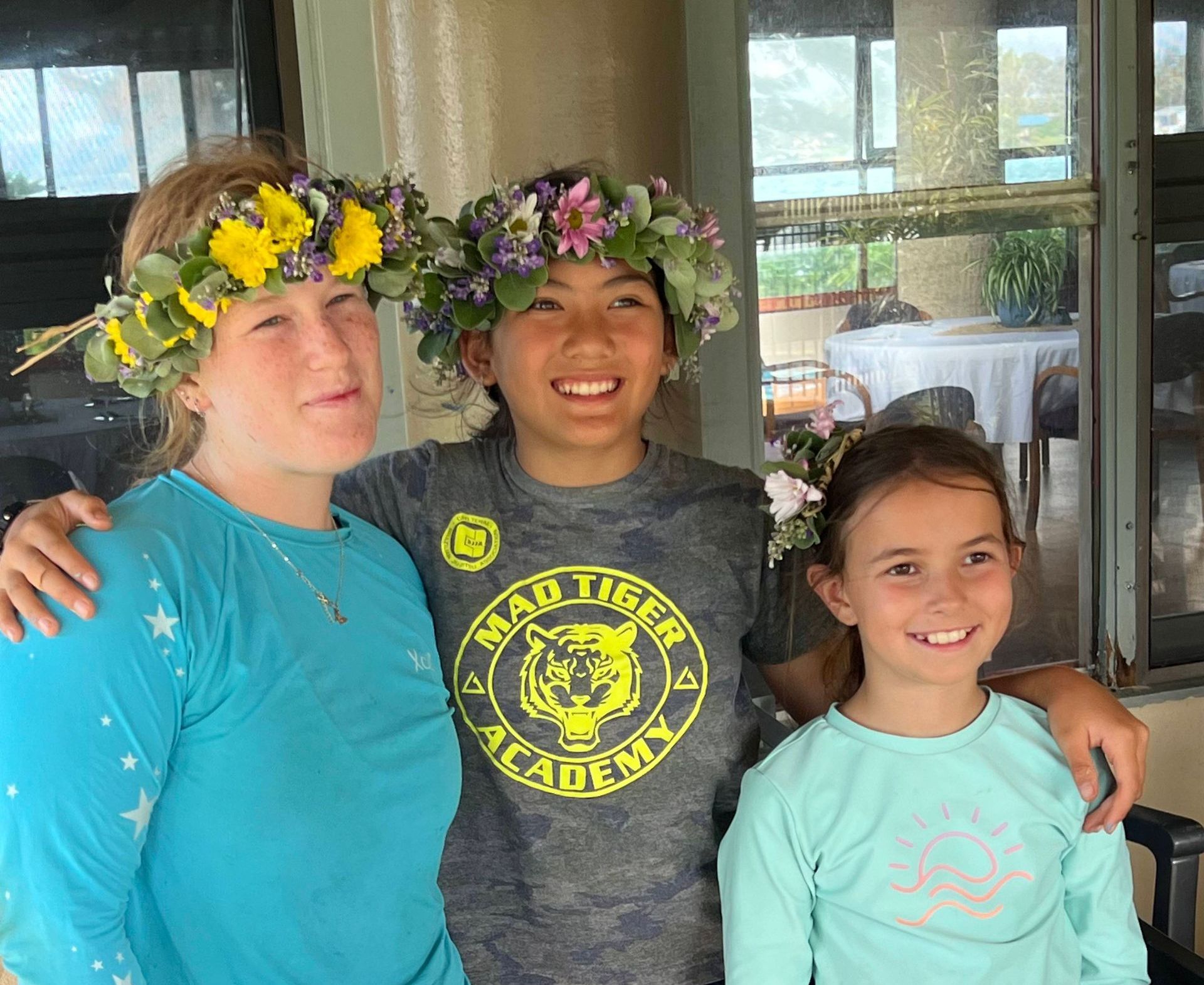 A man is getting ready to paddle a kayak on the beach
