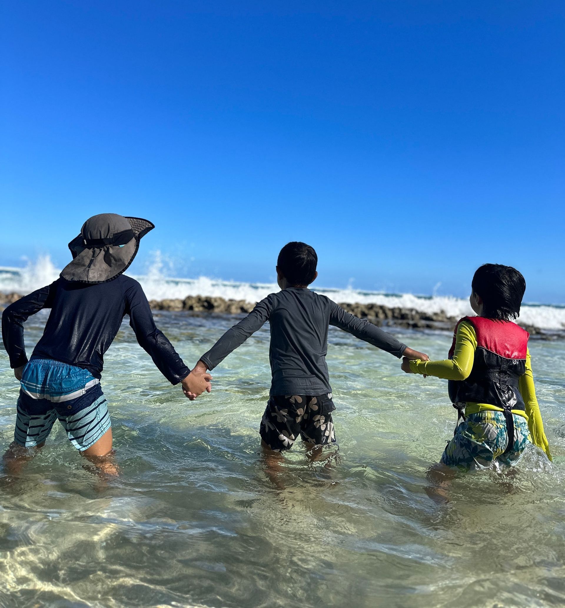 Children playing in Ocean