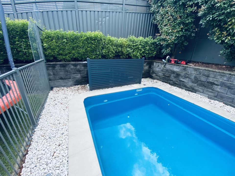 A Backyard Pool With Blue Water — Tempshift Pool Heating in Buff Point, NSW