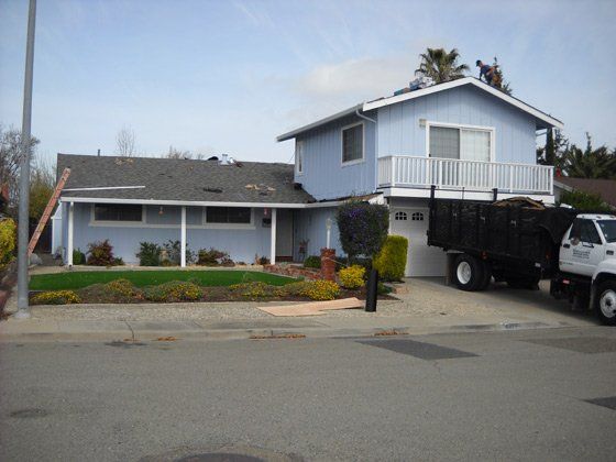 Reroofing — Blue House in Fremont, CA