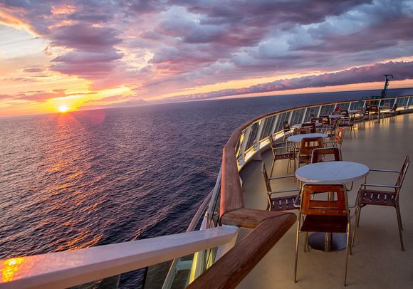 Sunset on a Cruise Ship — Puyallup, WA — Carefree Travel & Cruise LLC