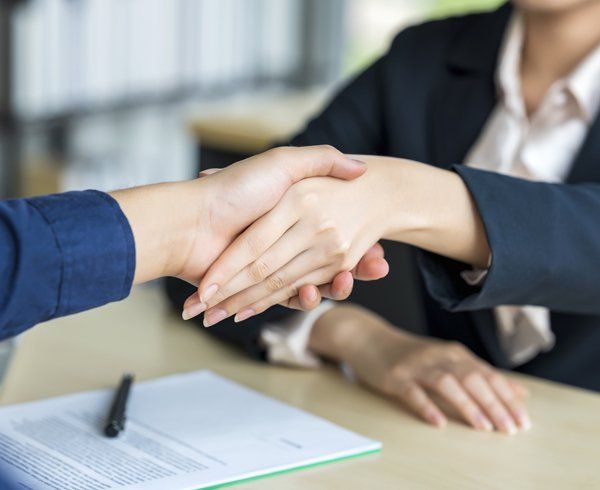 Insurance Agent and Client Shaking Hands — Martinez, GA — Satcher Insurance Services, Inc.