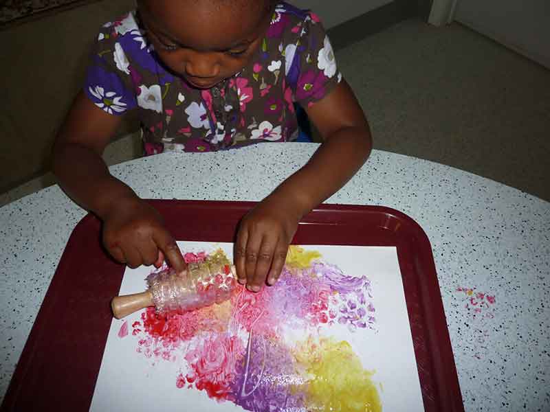 Kid painting on paper - Preschool in Beaverton, OR