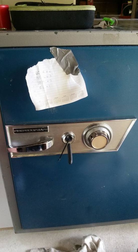 A Blue Safe With a Piece of Paper Sticking Out of It — South Coast Locksmiths in Fairy Meadow, NSW