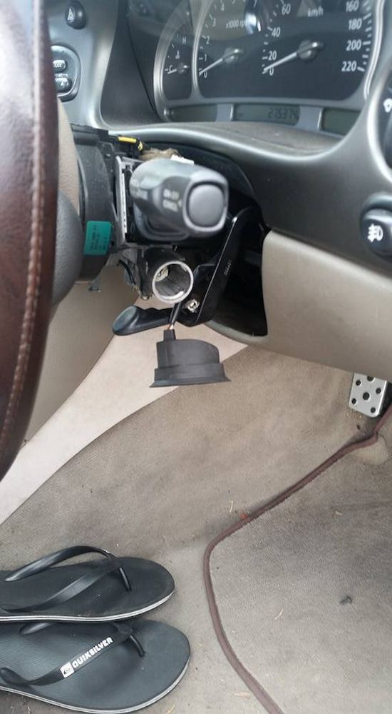 A Pair of Flip Flops Are Sitting on the Floor of a Car — South Coast Locksmiths in Fairy Meadow, NSW