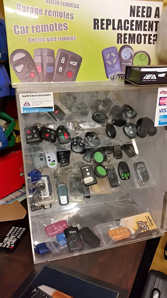 A Display Case Filled With a Variety of Car Remotes — South Coast Locksmiths in Fairy Meadow, NSW