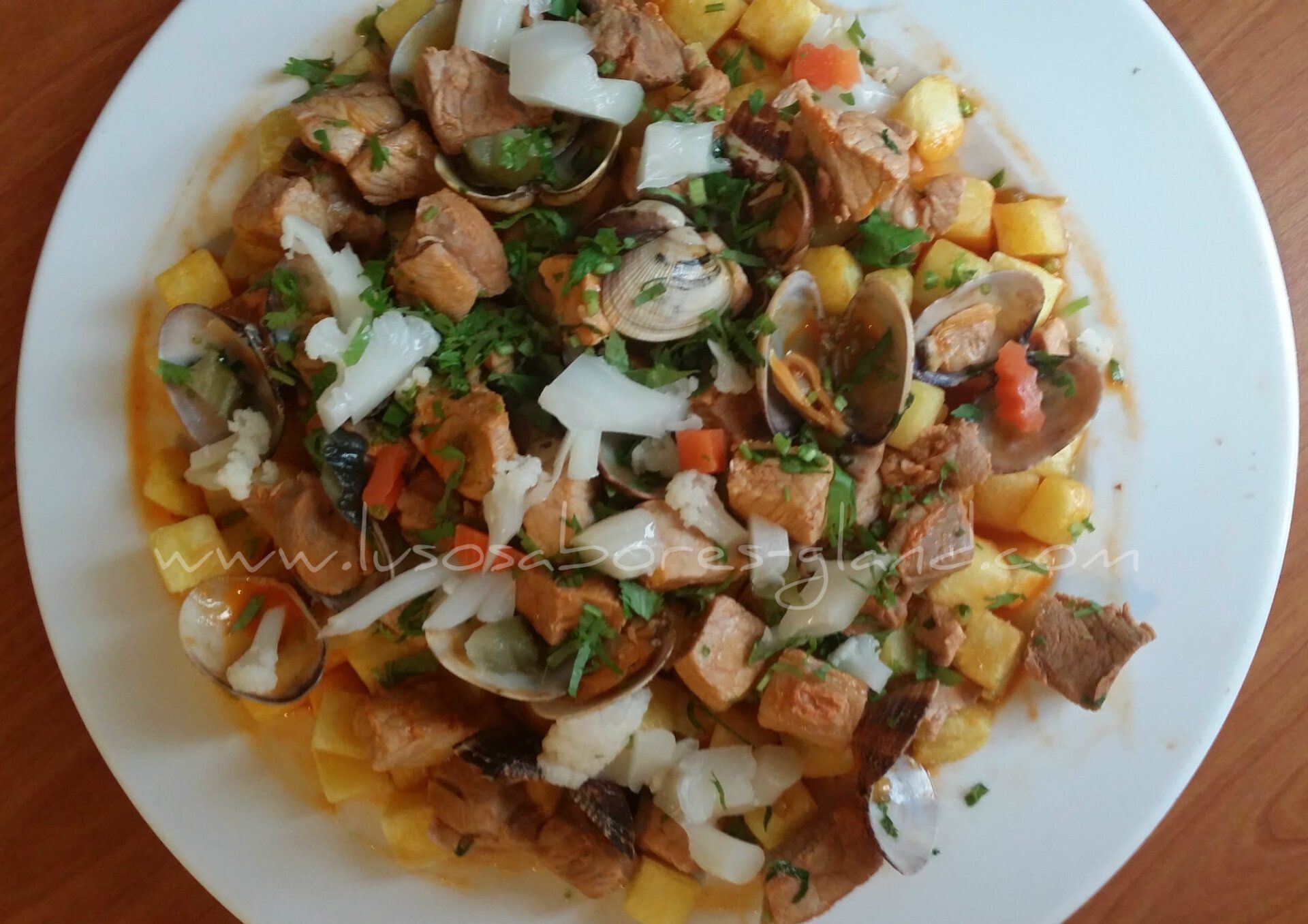 Carne porco a alentejana