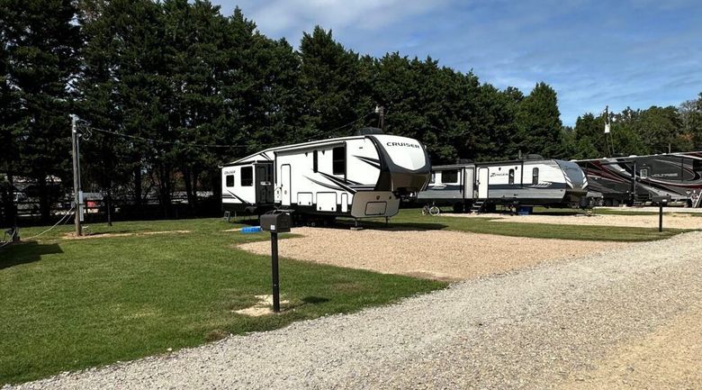 Premium long-term RV site with gravel pad and hookups