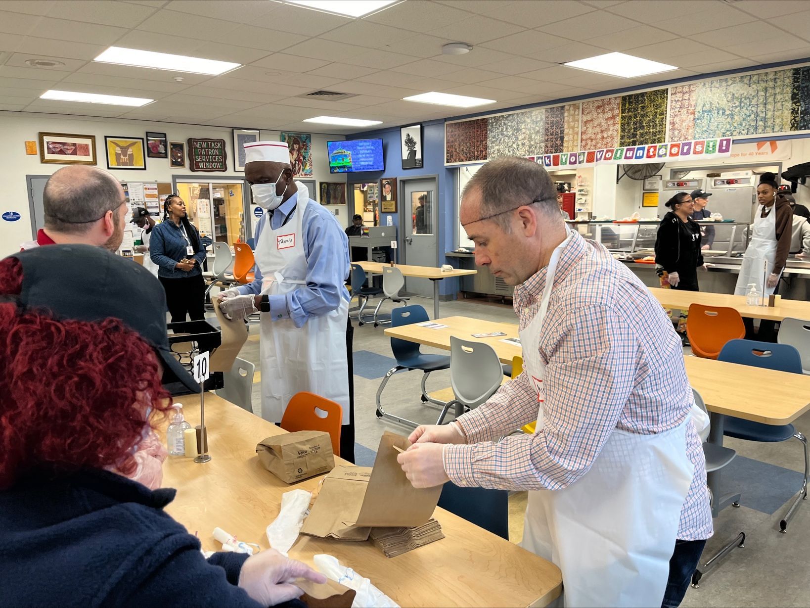 Volunteers packing up food at Trenton Soup Kitchen