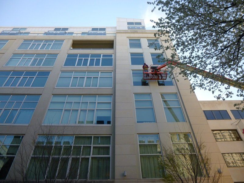 Crane on facade of building