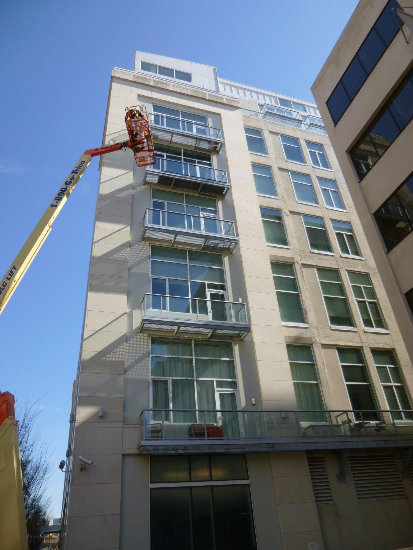 high-rise building with crane