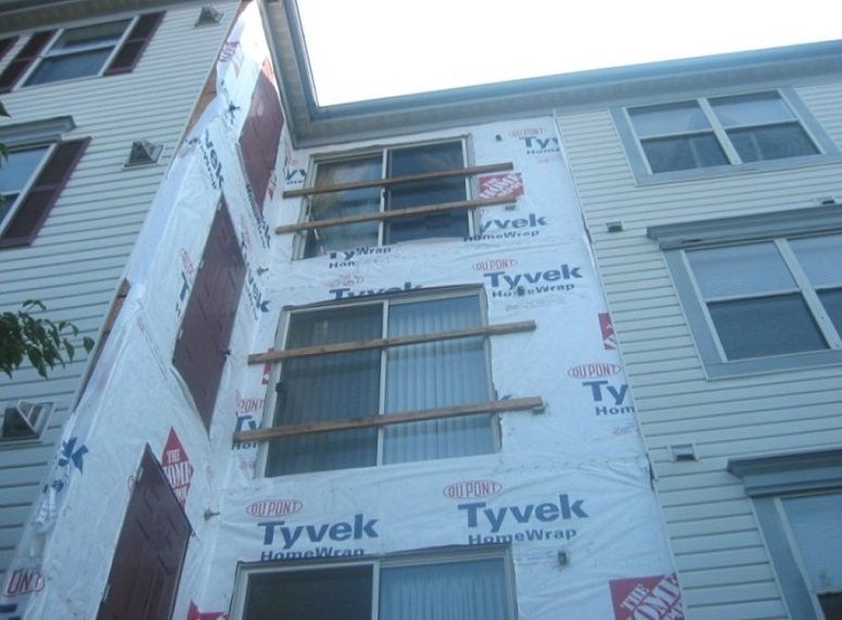 Siding replacement on side of building