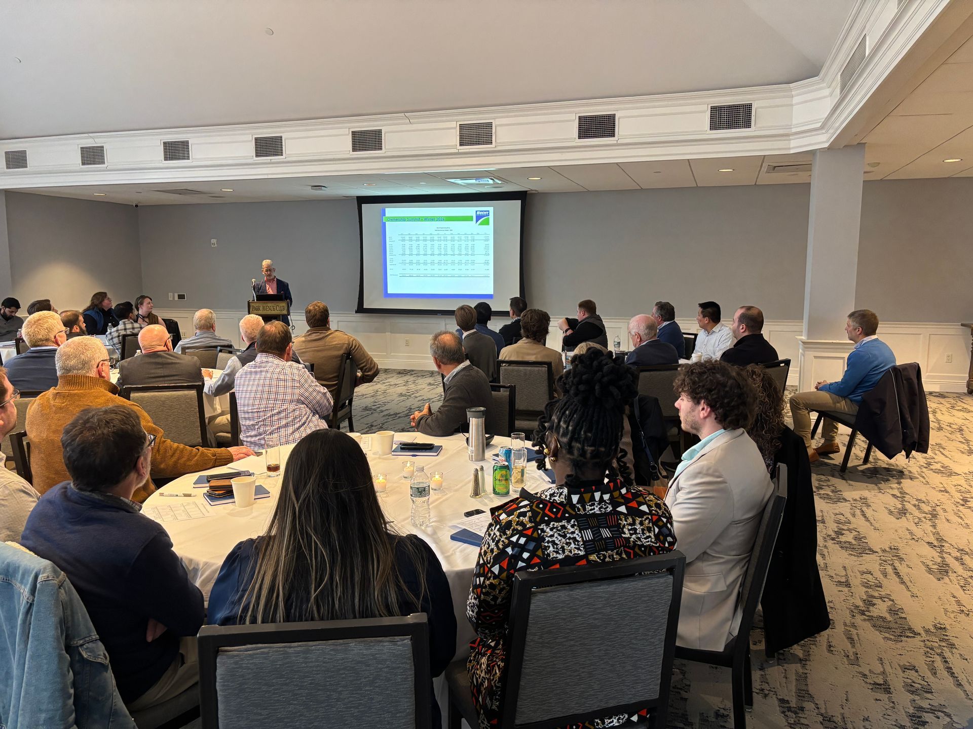 Becht staff at company meeting