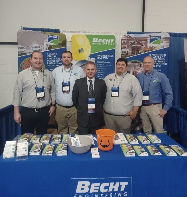 Photo of Becht staff at an event