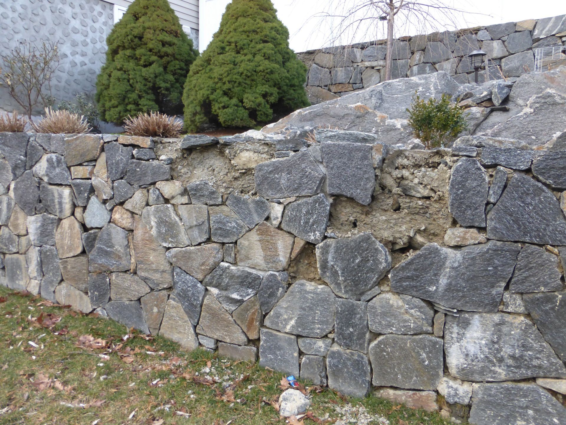 Deteriorated Rubble Stone Retaining Wall
