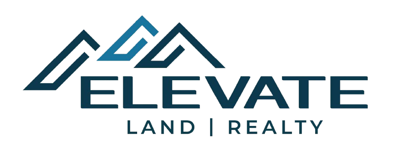 Logo for Elevate Land | Realty; features mountains and text in teal and white.