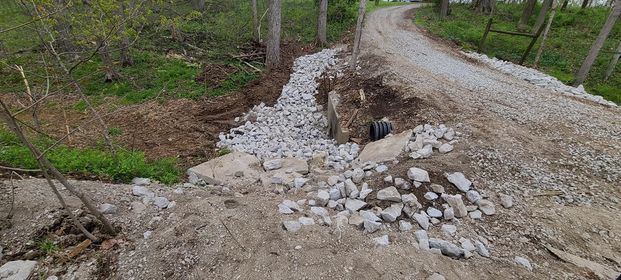 Dirt road with rocks surrounding it - Campbellsburg, IN | Twisted Electric LLC 