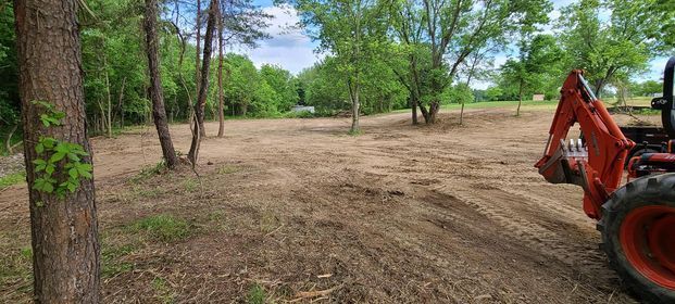 Beautiful day with tractor driving through a dirt field - Campbellsburg, IN | Twisted Electric LLC 