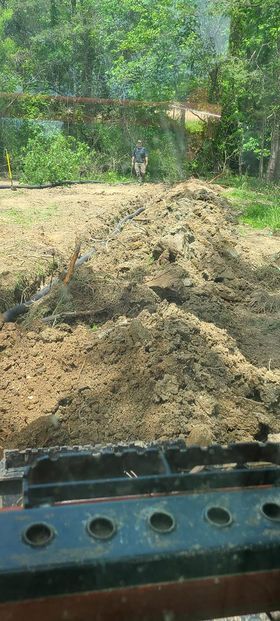 Pile of dirt sitting in the middle of a field with rocks - Campbellsburg, IN | Twisted Electric LLC 