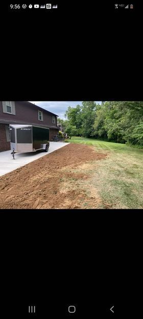 Small trailer parked in a driveway next to a house - Campbellsburg, IN | Twisted Electric LLC 