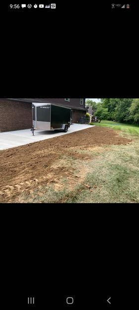 Trailer parked in a driveway next to a house - Campbellsburg, IN | Twisted Electric LLC 