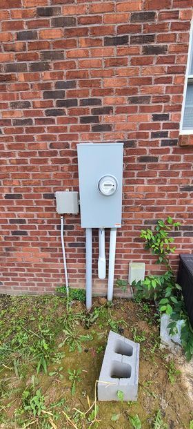 Meter on the side of a brick building - Campbellsburg, IN | Twisted Electric LLC 