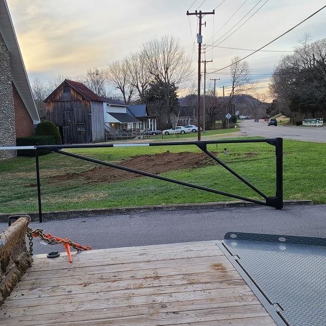 Black gate sitting on the side of the road - Campbellsburg, IN | Twisted Electric LLC 