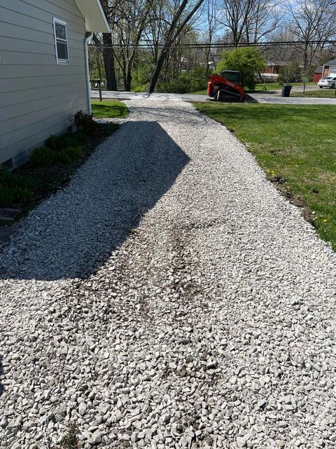 Gravel driveway with roof shadow casted on it - Campbellsburg, IN | Twisted Electric LLC 