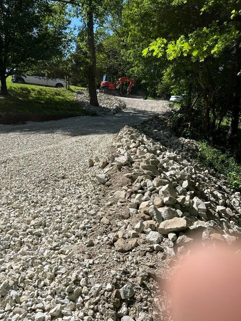 Pile of gravel beside road with human finger - Campbellsburg, IN | Twisted Electric LLC 