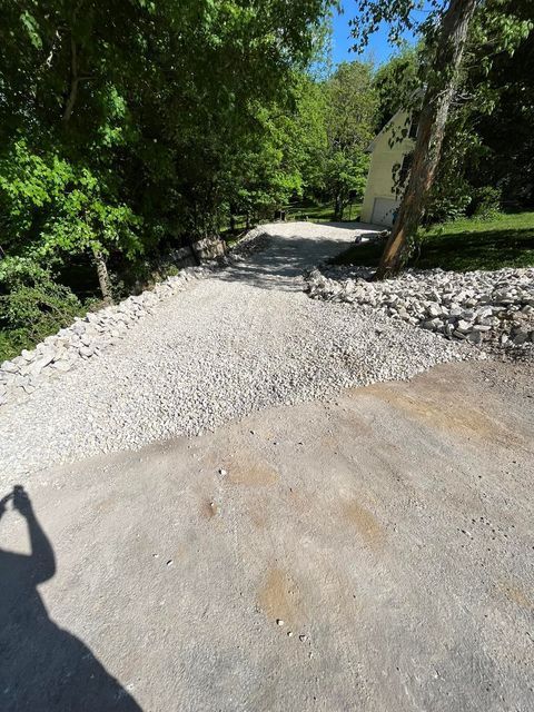 Man casted shadow capturing gravel road - Campbellsburg, IN | Twisted Electric LLC 