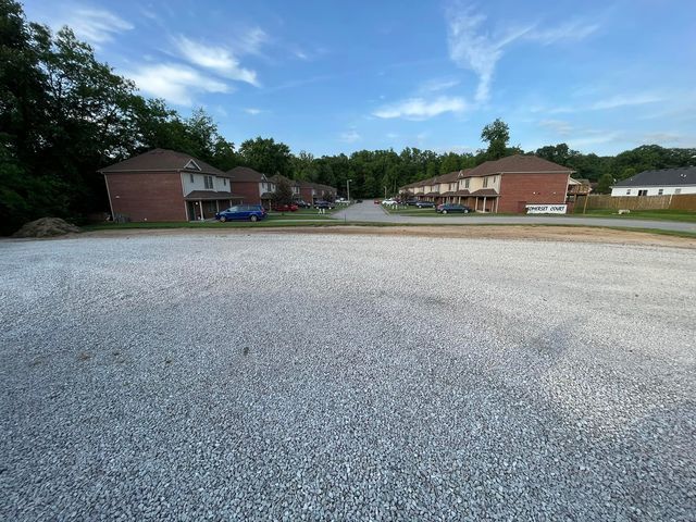 Large gravel road with town house background - Campbellsburg, IN | Twisted Electric LLC 