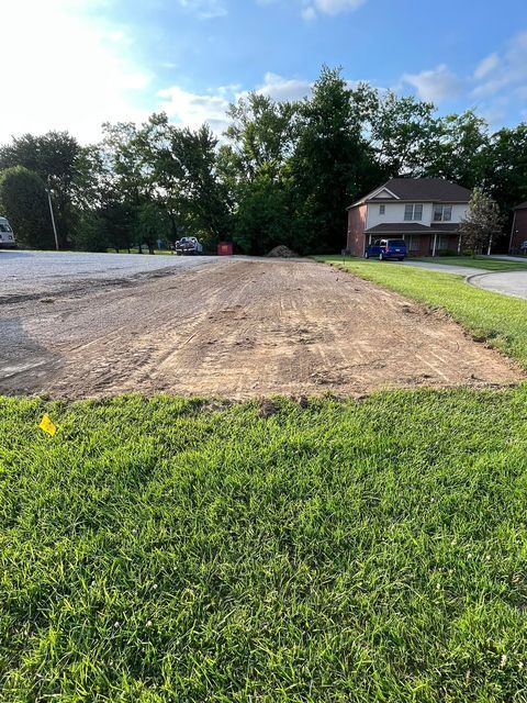 Newly created dirt on a grass field - Campbellsburg, IN | Twisted Electric LLC 