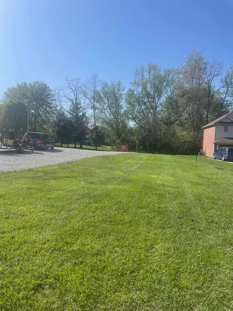 Truck parked beside house with huge grassy lawn - Campbellsburg, IN | Twisted Electric LLC 