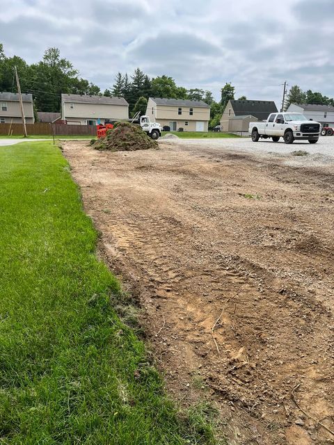 White truck parked on driveway beside grass and dirt - Campbellsburg, IN | Twisted Electric LLC 