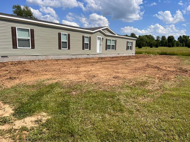 Newly built house beside grass - Campbellsburg, IN | Twisted Electric LLC 