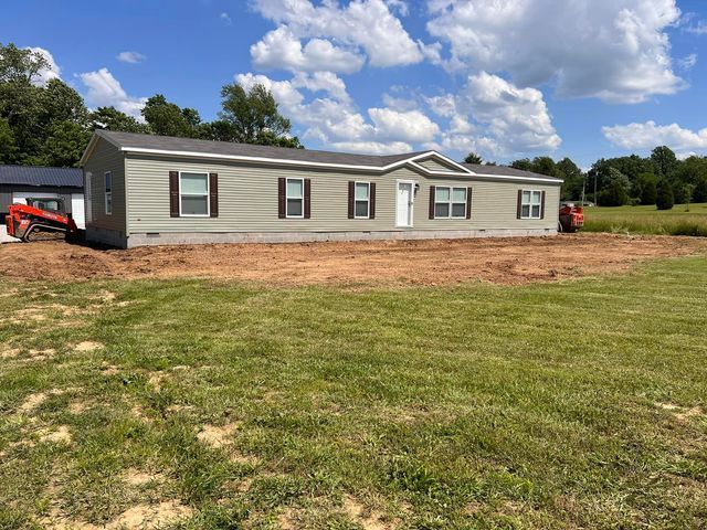 Newly built house beside green grass - Campbellsburg, IN | Twisted Electric LLC 