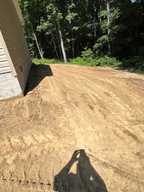 Man capturing house using smartphone - Campbellsburg, IN | Twisted Electric LLC 