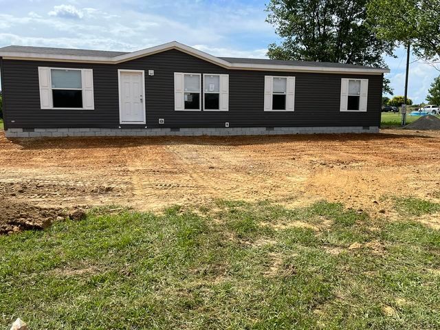 Dark and white house beside dirt road - Campbellsburg, IN | Twisted Electric LLC 