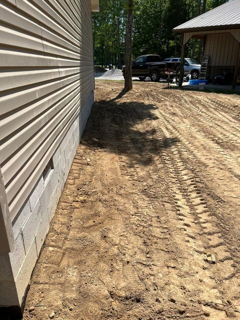 Dirty wood house beside a truck parked in the background - Campbellsburg, IN | Twisted Electric LLC 