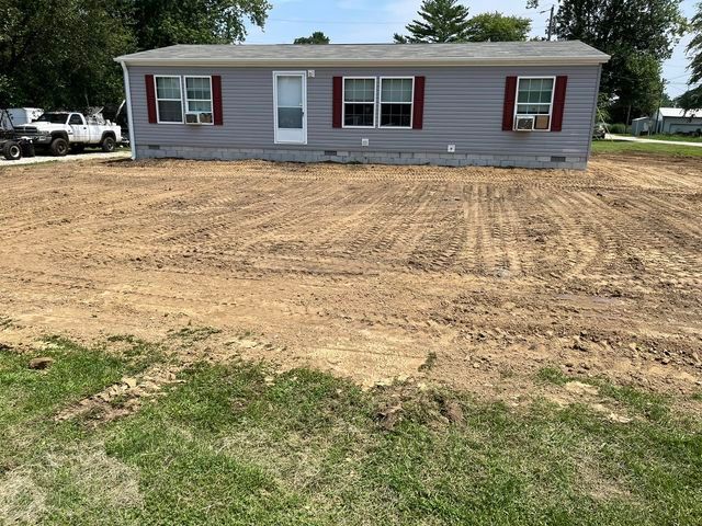 Isolated mobile home sitting in the middle of a dirt field - Campbellsburg, IN | Twisted Electric LLC 